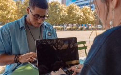 people working at laptop