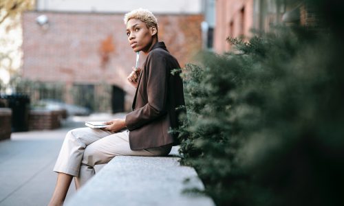 woman sitting on bench